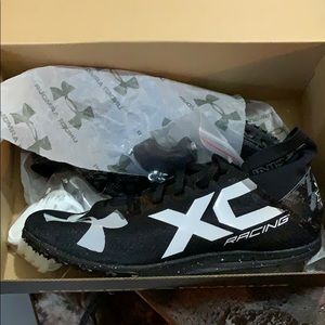 New in box cross country spikes